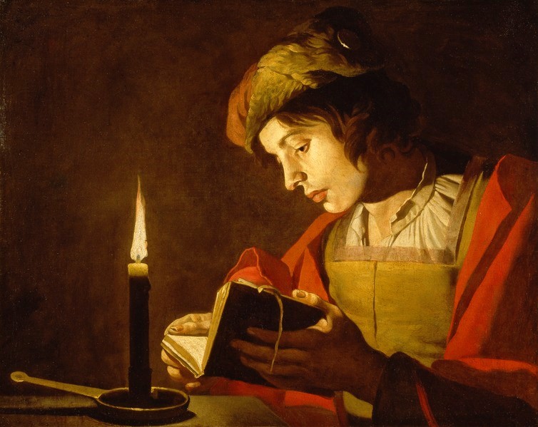 Um jovem lendo à luz de vela, obra de Matthias Stom (1615-1649).